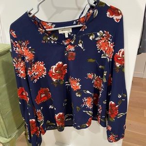 Gorgeous floral blouse with cut out sleeves